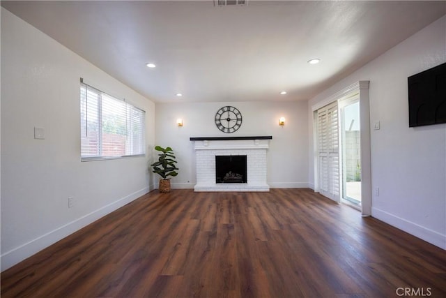 3644 Ardilla Ave, Baldwin Park, CA 91706 - unfurnished living room with a fireplace, dark wood finished floors, and recessed lighting