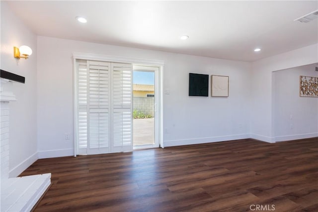 3644 Ardilla Ave, Baldwin Park, CA 91706 - unfurnished room with wood finished floors, recessed lighting, and a brick fireplace