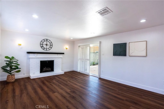 3644 Ardilla Ave, Baldwin Park, CA 91706 - unfurnished living room with wood finished floors, a fireplace, and recessed lighting