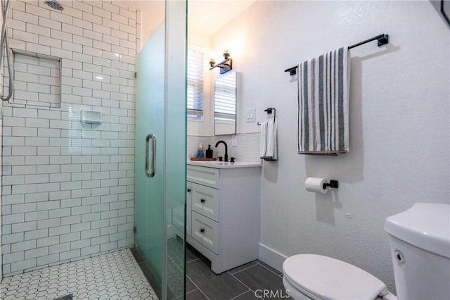 3644 Ardilla Ave, Baldwin Park, CA 91706 - full bathroom with a shower stall, vanity, and tile patterned floors
