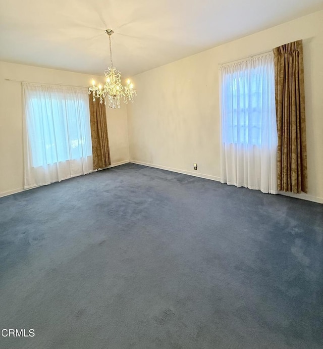 250 S Berkeley Ave, Pasadena, CA 91107 - empty room featuring a chandelier and dark carpet