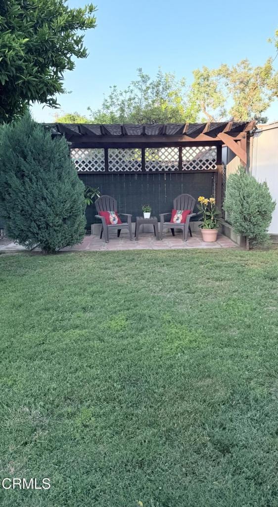 250 S Berkeley Ave, Pasadena, CA 91107 - view of green lawn with a pergola, a patio, and outdoor lounge area
