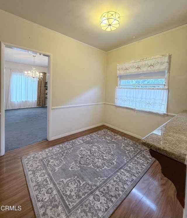 250 S Berkeley Ave, Pasadena, CA 91107 - dining room featuring a chandelier, wood finished floors, and ornamental molding