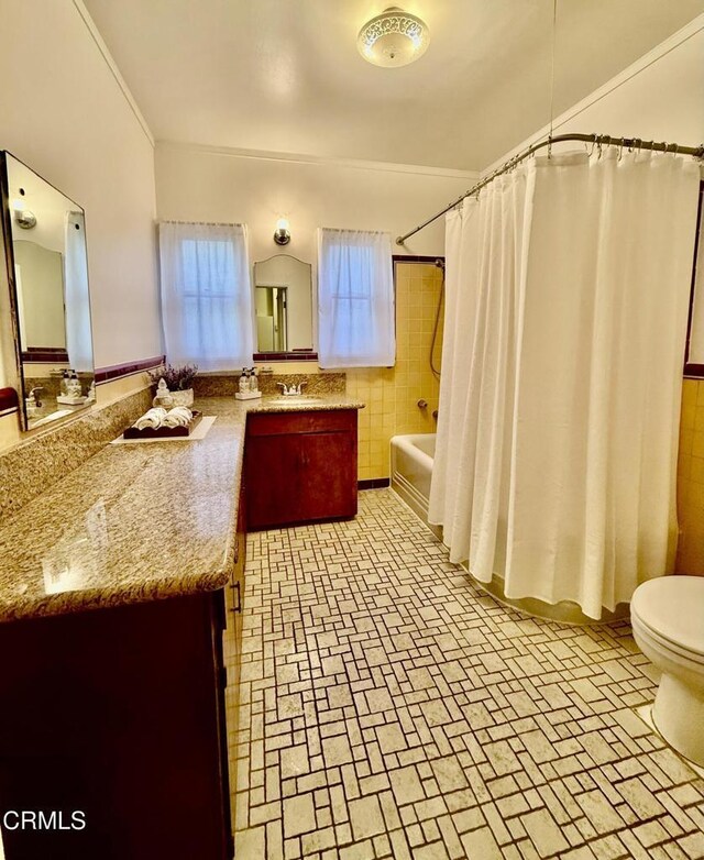 250 S Berkeley Ave, Pasadena, CA 91107 - full bathroom with shower / bath combo, vanity, brick patterned floors, and crown molding