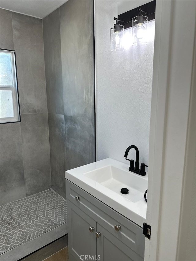 259 Freda Ave, Pomona, CA 91767 - full bathroom featuring vanity and a tile shower