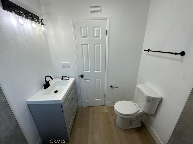 259 Freda Ave, Pomona, CA 91767 - bathroom featuring wood finished floors and vanity