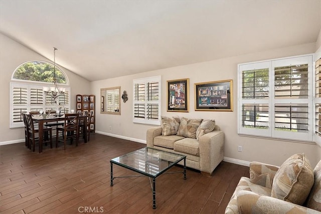 1413 Daisy St, Upland, CA 91784 - living area featuring dark wood-style flooring, a chandelier, and vaulted ceiling