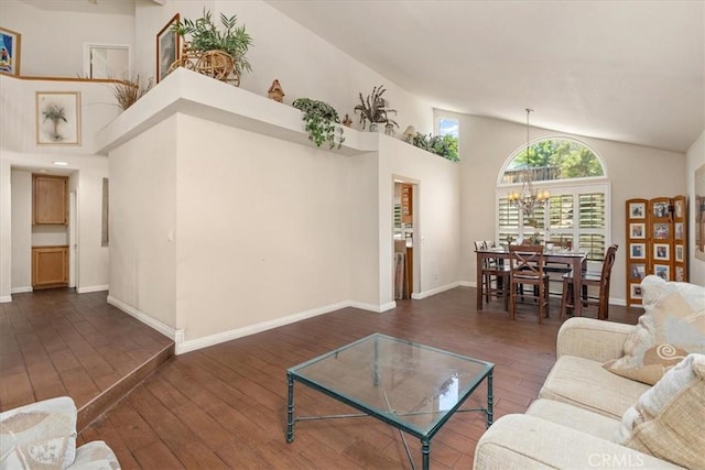 1413 Daisy St, Upland, CA 91784 - living area with wood-type flooring, a chandelier, and high vaulted ceiling