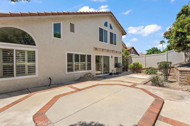 1413 Daisy St, Upland, CA 91784 - back of house featuring stucco siding and a patio