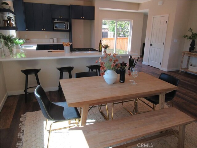 7906 Curbaril Ave, Atascadero, CA 93422 - dining room with dark wood-style floors