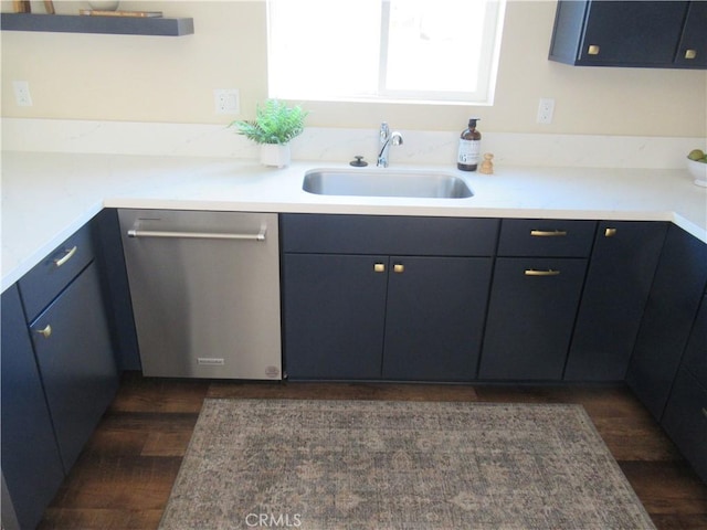 7906 Curbaril Ave, Atascadero, CA 93422 - kitchen with stainless steel dishwasher, dark wood-type flooring, and light countertops