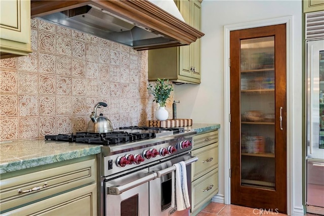 1335 Crestview Ave, Seal Beach, CA 90740 - kitchen featuring custom range hood, double oven range, cream cabinetry, and decorative backsplash