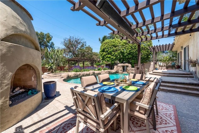 1335 Crestview Ave, Seal Beach, CA 90740 - view of patio / terrace featuring outdoor dining space, an outdoor fireplace, a pergola, and an outdoor pool
