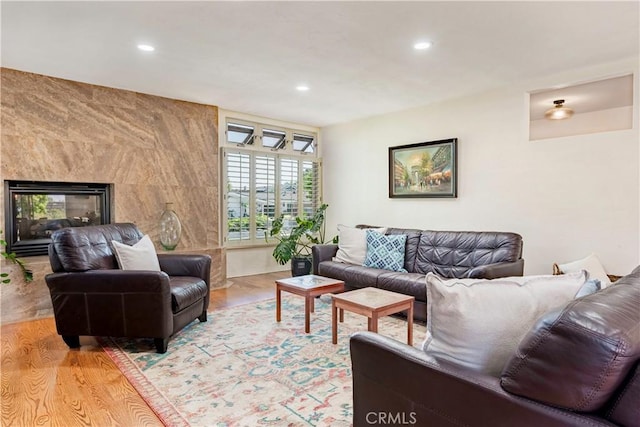 1335 Crestview Ave, Seal Beach, CA 90740 - living room featuring recessed lighting, light wood finished floors, and a fireplace
