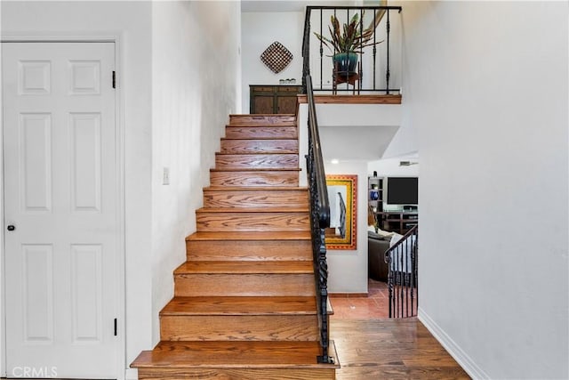 1335 Crestview Ave, Seal Beach, CA 90740 - staircase featuring wood finished floors