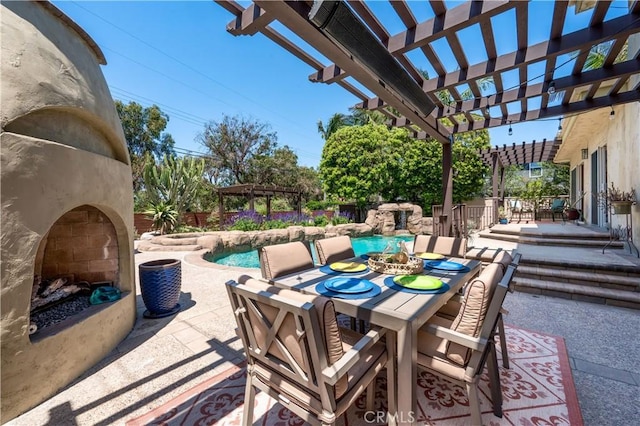 1335 Crestview Ave, Seal Beach, CA 90740 - view of patio with outdoor dining area, an outdoor fireplace, a pergola, and an outdoor pool