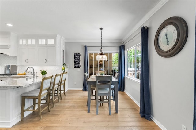 12554 Tejas Ct, Rancho Cucamonga, CA 91739 - dining area featuring ornamental molding, light wood finished floors, and recessed lighting