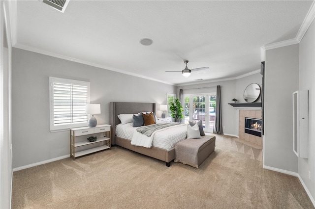12554 Tejas Ct, Rancho Cucamonga, CA 91739 - bedroom featuring carpet floors, ornamental molding, a tile fireplace, and ceiling fan