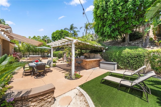 12554 Tejas Ct, Rancho Cucamonga, CA 91739 - view of patio with area for grilling, a pergola, and outdoor dining space