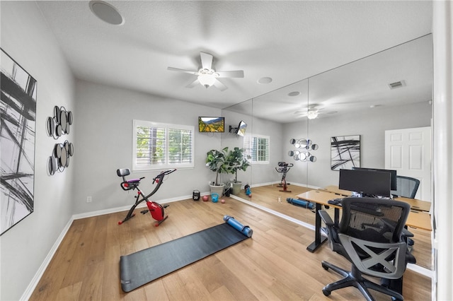 12554 Tejas Ct, Rancho Cucamonga, CA 91739 - exercise area featuring a ceiling fan and wood finished floors