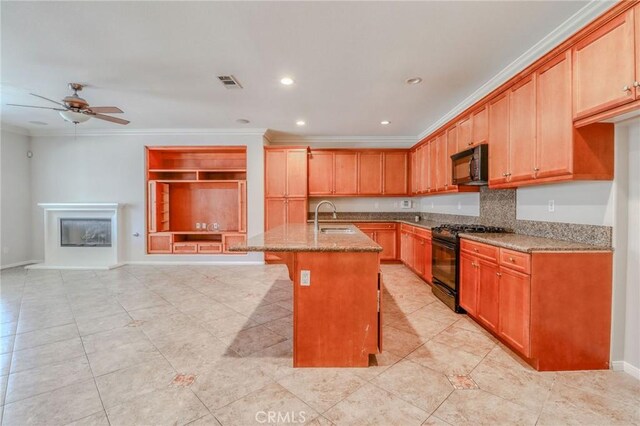26946 Shelter Cove Ct, Menifee, CA 92585 - kitchen featuring black appliances, light stone countertops, ornamental molding, ceiling fan, and light tile patterned floors