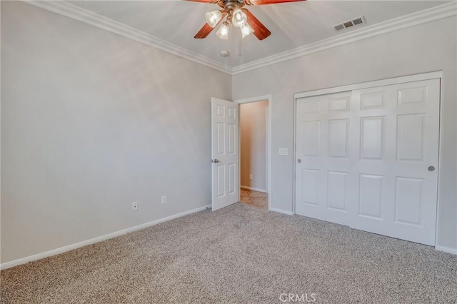 26946 Shelter Cove Ct, Menifee, CA 92585 - unfurnished bedroom featuring carpet flooring, ornamental molding, a closet, and ceiling fan