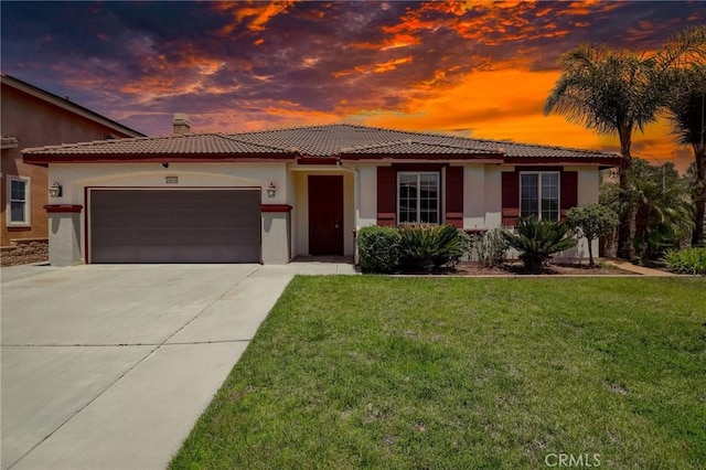 26946 Shelter Cove Ct, Menifee, CA 92585 - view of front facade with concrete driveway, a tile roof, an attached garage, and a lawn