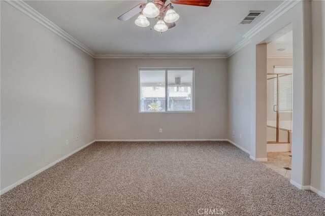 26946 Shelter Cove Ct, Menifee, CA 92585 - spare room featuring ceiling fan, carpet, and crown molding