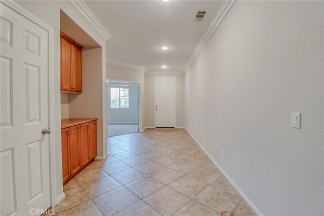 26946 Shelter Cove Ct, Menifee, CA 92585 - hallway featuring recessed lighting, crown molding, and light tile patterned flooring
