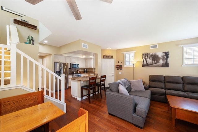 51 Rue Monet, Lake Forest, CA 92610 - living room featuring stairs, dark wood-style flooring, and ceiling fan