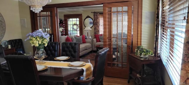 1320 Granada Ave, San Diego, CA 92102 - dining room featuring a chandelier and wood finished floors