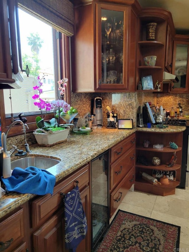 1320 Granada Ave, San Diego, CA 92102 - bar featuring wine cooler, under cabinet range hood, and backsplash