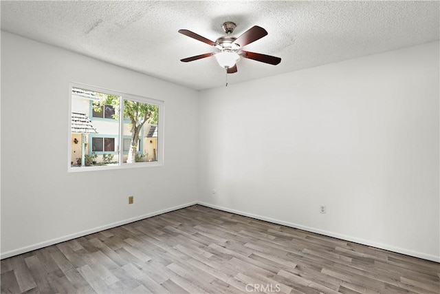 2536 Bryn Mawr Ln, Riverside, CA 92507 - empty room with wood finished floors, ceiling fan, and a textured ceiling