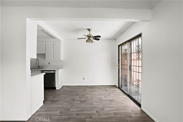 2536 Bryn Mawr Ln, Riverside, CA 92507 - unfurnished dining area with ceiling fan, wood finished floors, and a textured ceiling