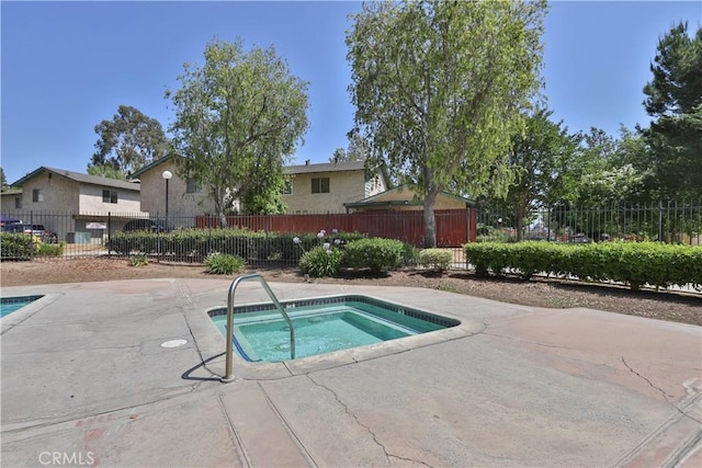 2536 Bryn Mawr Ln, Riverside, CA 92507 - view of pool with a community hot tub and a patio area
