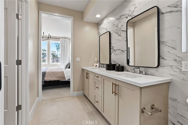 19011 Main St Unit 113, Huntington Beach, CA 92648 - ensuite bathroom with double vanity and recessed lighting
