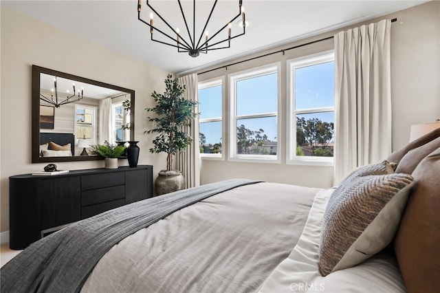 19011 Main St Unit 113, Huntington Beach, CA 92648 - bedroom featuring a chandelier