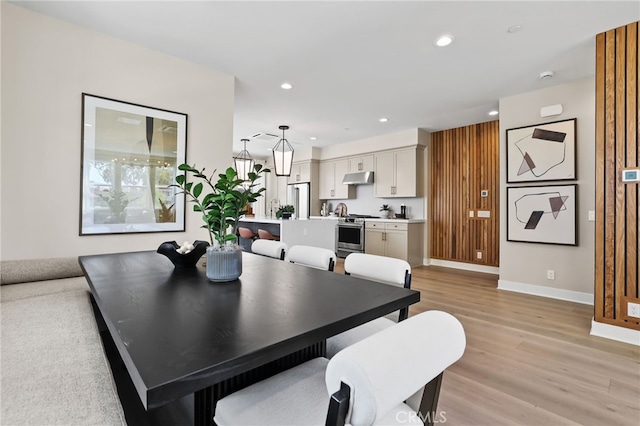 19011 Main St Unit 113, Huntington Beach, CA 92648 - dining space with light wood-style flooring and recessed lighting
