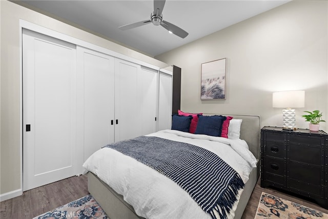 1046 Calle Del Cerro Unit 412, San Clemente, CA 92672 - bedroom with a closet, wood finished floors, and ceiling fan
