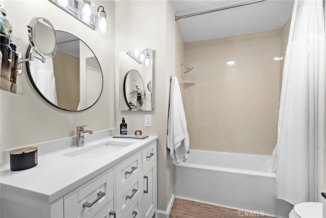 1046 Calle Del Cerro Unit 412, San Clemente, CA 92672 - bathroom featuring shower / tub combo with curtain, vanity, and wood finished floors