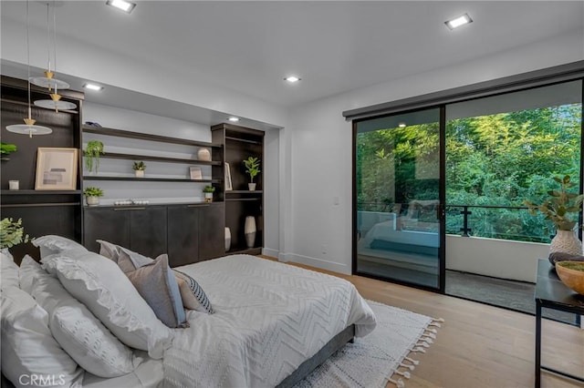 15125 Rayneta Dr, Sherman Oaks, CA 91403 - bedroom with access to exterior, wood finished floors, multiple windows, and recessed lighting