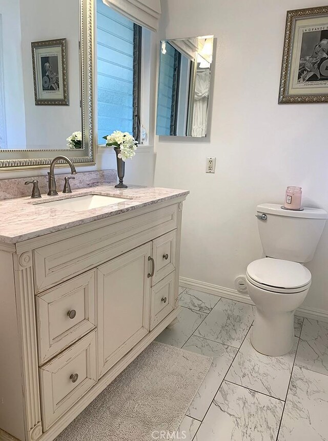 26261 Veva Way, Calabasas, CA 91302 - bathroom with marble look tile flooring and vanity