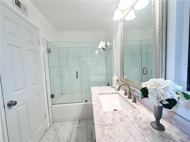 26261 Veva Way, Calabasas, CA 91302 - full bathroom featuring shower / bath combination with glass door, marble finish floors, and vanity