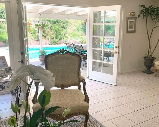 26261 Veva Way, Calabasas, CA 91302 - entryway featuring light tile patterned flooring and baseboards
