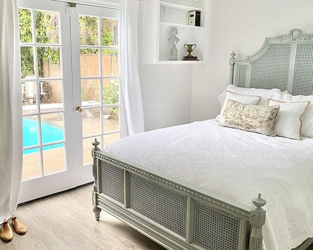 26261 Veva Way, Calabasas, CA 91302 - bedroom with multiple windows and wood finished floors