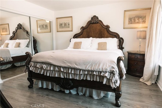 26261 Veva Way, Calabasas, CA 91302 - bedroom featuring wood finished floors and a closet