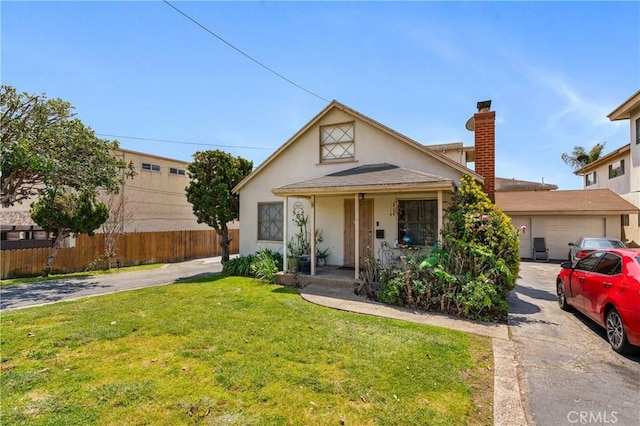 1900 Vanderbilt Ln, Redondo Beach, CA 90278 - view of front of home featuring stucco siding, driveway, and a chimney