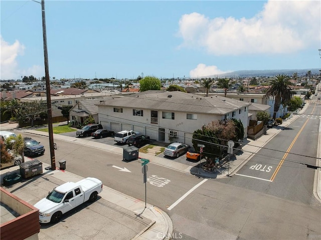1900 Vanderbilt Ln, Redondo Beach, CA 90278 - view of asphalt road featuring a residential view, sidewalks, and curbs