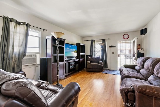 1900 Vanderbilt Ln, Redondo Beach, CA 90278 - living area featuring plenty of natural light, cooling unit, and light wood-style flooring
