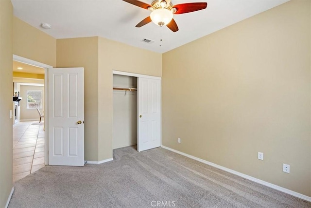 839 Chukar St, Arroyo Grande, CA 93420 - unfurnished bedroom featuring light colored carpet, a closet, and a ceiling fan